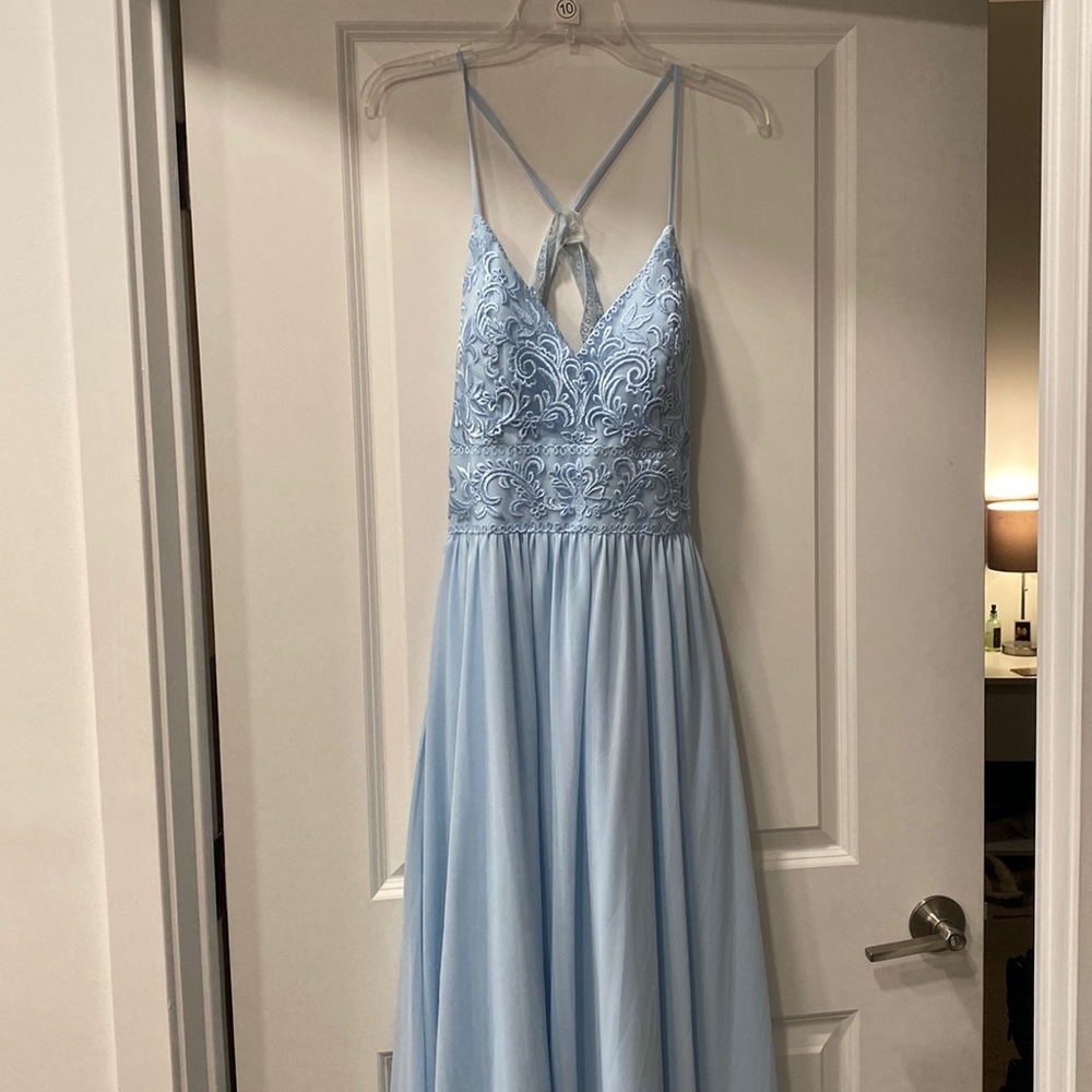 Kennedy Blue. Color is “sky” aka light blue. Size 10. Never worn. Unaltered.